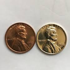 We look at gold pennies and silver pennies in this video and their coin value. 1968 No Mint Mark Lincoln Cent Gold Colored Coin Talk