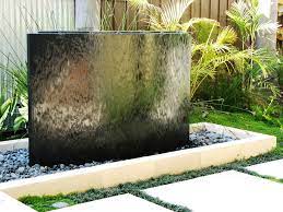 The stone water fountain for outdoors is easy to install and use by pouring the water into the lower tier and plugging the electric water pump into a standard wall outlet. 49 Amazing Outdoor Water Walls For Your Backyard Digsdigs