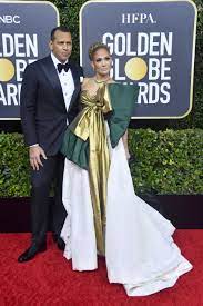 The best dressed stars at the 2021 sag awards. Jennifer Lopez Wears Gold Bow Dress With Alex Rodriguez At Golden Globes 2020