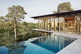 My Scandinavian Home A Contemporary Swedish Hillside Cabin With An Incredible Infinity Pool My Scandinavian Home Infinity Pool Summer House Nestled in the hills overlooking all the forest, we loved sitting on our balcony and looking at the scenery.