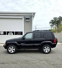 Image result for Brilliant Black 2003 Jeep