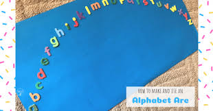 A durable dry wipe mat that is ideal for alphabet sequencing activities with a bright rainbow arc one side and an arc of letters on the other. How To Make And Use An Alphabet Arc Teach Me Mommy