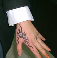 This list of small tattoos for men not only gives you an idea for your next tattoo design but also give you a reason why you should. Tribal Hand Tattoos Hand Tattoos For Guys Small Tattoos For Guys