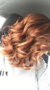 This hairstyle is much lighter than the first, beginning with a dirty blonde color at the top and the almost black hair fades gracefully down to a warm brown color, almost verging on an auburn hue. Red Hair With Blonde Highlights And Auburn Lowlights Red Hair With Blonde Highlights