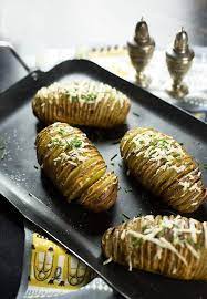 Cheesy Hasselback Potatoes Kiwi And Carrot Recipe Hasselback Potatoes Russet Potato Recipes Easy Potato Recipes