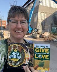 Here is our Dean Leslie Warren outside of the Harden Hall construction  site, ready for NMU Giving Day! Give to what you love, the library. We  can't wait to share our renovated