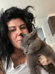 My Beautiful Rescue cat BeeBee she loves her cuddles with mum In the  morning but not her photo taken so a one off