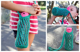 Stretchy knit hugs baby close. Knit Bishi Net Water Bottle Carrier Free Knitting Pattern