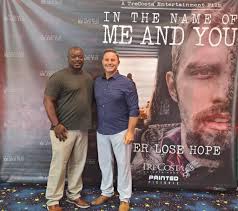 The Biz with NormBeezy and Lady T.