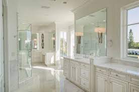 Maybe you would like to learn more about one of these? Traditional White Master Bathroom With Wall Sconces And Raised Panel Cabinets Luxury Master Bathrooms White Master Bathroom Bathroom Remodel Master