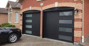 A garage door can make up a large portion of your home's exterior design. Residential Garage Doors Mississauga Greater Toronto Area
