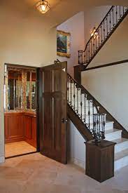 Placing the front stairway to the side of the entry enables guests standing at the front door of this home to see through to the rest of the first level. Exterior Front Elevation Staircase Houzz
