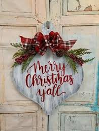 No christmas decoration is complete without a wreath welcoming guests you can purchase large wooden or foam letters at a nearby hobby shop, and paint them. 200 Christmas Door Hangers Ideas In 2020 Christmas Door Christmas Door Hanger Door Hangers