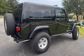 Image result for Brilliant Black 2004 Jeep