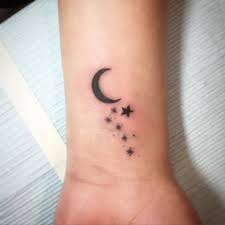 42 Beautiful Small Tattoo Ideas For Your Page 13 Of 42 Lovein Home Small Moon Tattoos Star Tattoos Moon Tattoo Wrist