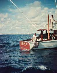 1950s Deep Sea Fishing Boat Man Pulling Photograph By Vintage Images