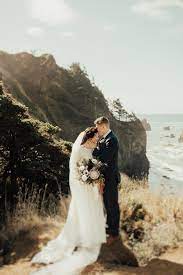 Vintage Inspired Cannon Beach Wedding With Evergreen Details Junebug Weddings Beautiful Beach Wedding Beach Wedding Packages Beach Wedding Photos