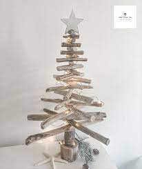 Not only is it stunning, it's also a great prop for christmas photos! A Unique Christmas Tree Made From Driftwood Collected On The Shoreline Of Christmas Decorations Diy Outdoor Office Christmas Decorations Unique Christmas Trees