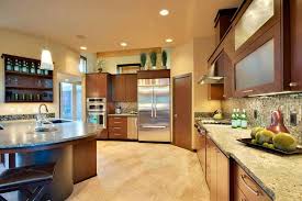 A stylish kitchen with an aqua colored breakfast island, wooden chairs, stainless steel appliances and a classic white kitchen with wooden cabinets, an island table with marble countertop, pendant lights. 50 Yellow Kitchen Ideas Photos Home Stratosphere