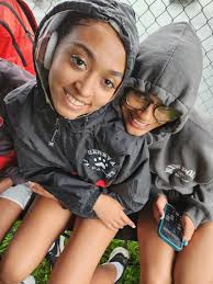 Learning to smile through the rain at the Wayne Finger Lakes Divisional  Championships! 👟🌦