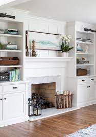 Minimalism scales to the max in clean, pristine white. Living Room Fireplace And Bookcase Styling Decorating Tips Ideas