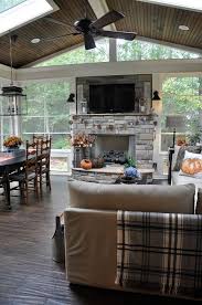 Photo inspiration for your sunroom, conservatory and patio enclosures. 34 Cozy Fireplace Outdoor Ideas With Bar Decor Homeridian Com House With Porch Sunroom Designs Cozy Fireplace