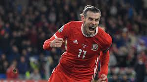' flag in the crowed. Gareth Bale Gives His Approval To His New Wales Golf Madrid Song Golfmagic