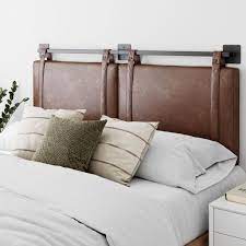 It is very easy to put up, the design is stunning, it has a nice and modern look, and it looks and feels as it. Nathan James Harlow King Wall Mount Headboard Faux Leather Upholstered Headboard Adjustable Height Vintage Brown Pu Leather Straps With Black Matte Metal Rail Upholstered Headboard Leather Headboard Gray Upholstered Headboard
