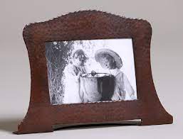 It features a protective coating to keep it looking great for many years to come. California Historical Design Gustav Stickley Hammered Copper Picture Frame