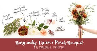 A burgundy bouquet that features a king protea and succulents is everything this year. Easy Hand Tied Burgundy Cream Wedding Bouquet Diy Tutorial