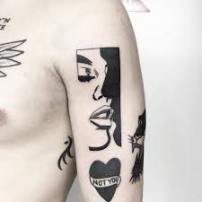Black And White Kiss Tattoo Black And White Kiss Tattoo On The Left Upper Arm Kiss Tattoos Tattoos Pop Art Tattoos