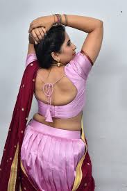 Anchor Indu hot stills in half saree - South Indian Actress