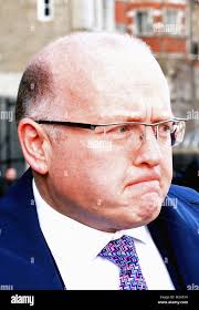 Keith cochrane, chief executive, leaves portcullis house in london after  answering questions at a joint hearing of the commons business, energy and  industrial strategy committee and the work and pensions committee, which