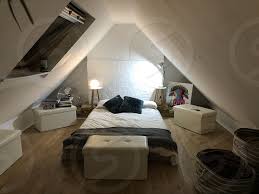Attic Low Level Bed And Soft Lighting By Lynn Thompson Photo Stock Snapwire