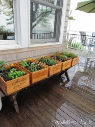 Adding a diy planter box to your porch or yard is a great way to add some curb appeal for just a little effort and money. Diy Herb Garden Deck Garden Diy Deck