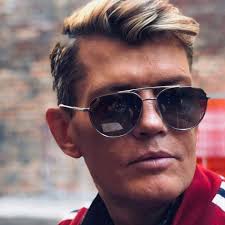 I want to share the story behind my only tattoo. The guy in the picture  below is Andrew McMillan, and we became friends around 1996 in Atlanta. He  was a South African