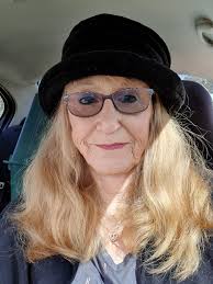 Hairstyle and color for women over 50 with natural red hair