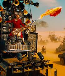 Mad Max I Live I Die I Live Again Gif Mad Max Fury Road Is Almost Stolen By A Flame Throwing Guitarist Mad Max Fury Road Mad Max Fury Mad Max