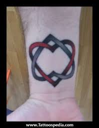 Lotus tattoos are very popular and can be a symbol of harmony. Interlocked Hearts Lovetoknow Heart Tattoo Celtic Heart Tattoo Tattoos