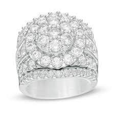 Though bridal bands that featured rose cut diamonds were used in the georgian era, gold wedding rings with diamonds became a widespread fashion across the globe in the twentieth century. 5 Ct T W Composite Diamond Three Piece Bridal Set In 10k White Gold Zales Outlet