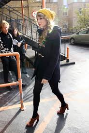 The singer has always incorporated her era of music into her street style. Candids 2010 Taylor Swift Style Taylor Swift Street Style Dresses With Leggings