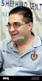 Mark Ayers, a Mississippi police officer paralyzed when he was shot in  June, smiles during a news conference at the Shepherd Center in Atlanta,  Wednesday, Sept. 13, 2006. Ayers spoke about his