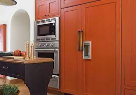 A Bold Burnt Orange Kitchen Burnt Orange Kitchen Kitchen Colors Orange Cabinets