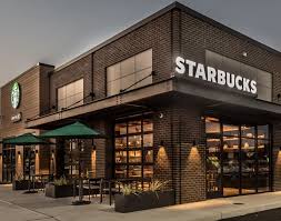 Starbucks Has Been Revolutionizing The Coffee Industry For Decades But How Does This Beloved Bra Restaurant Exterior Design Storefront Design Starbucks Design
