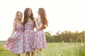 Spring is just a month and a half from here and spring couples are getting ready for their weddings. Floral Print Bridesmaid Dresses In Bloom On Trend Wedding Shoppe
