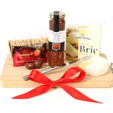 The Perfect Entertaining Pack With Savoury Treats Designed To Entice The Tastebuds Cheese Board And Stain Christmas Gift Baskets Best Gift Baskets Gift Hampers