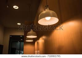 Modern led wall sconce lighting fixture lamps repaired with wicker. Shutterstock Puzzlepix
