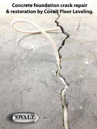 Directions on how to fill and repair concrete cracks, such as those in many driveways. Concrete Floor Crack Repair In Orange County Vs Mother Nature Covalt Leveling