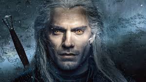 A curly style appears to be natural and recent look for the actor. Wallpaper The Witcher Netflix Tv Series Tv Series Henry Cavill Orange Eyes White Hair Men Long Hair Geralt Of Rivia The Witcher Tv Series Actor 5000x2812 Brycied00d 1739139 Hd Wallpapers Wallhere