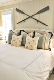 Coastal farmhouse bedroom update making just a few small tweaks to a space can really help it feel fresh and functional again. Decorating Ideas With Wooden Oars Paddles Wall Decor Racks Handrails More Coastal Bedroom Decorating Luxurious Bedrooms Bedroom Design